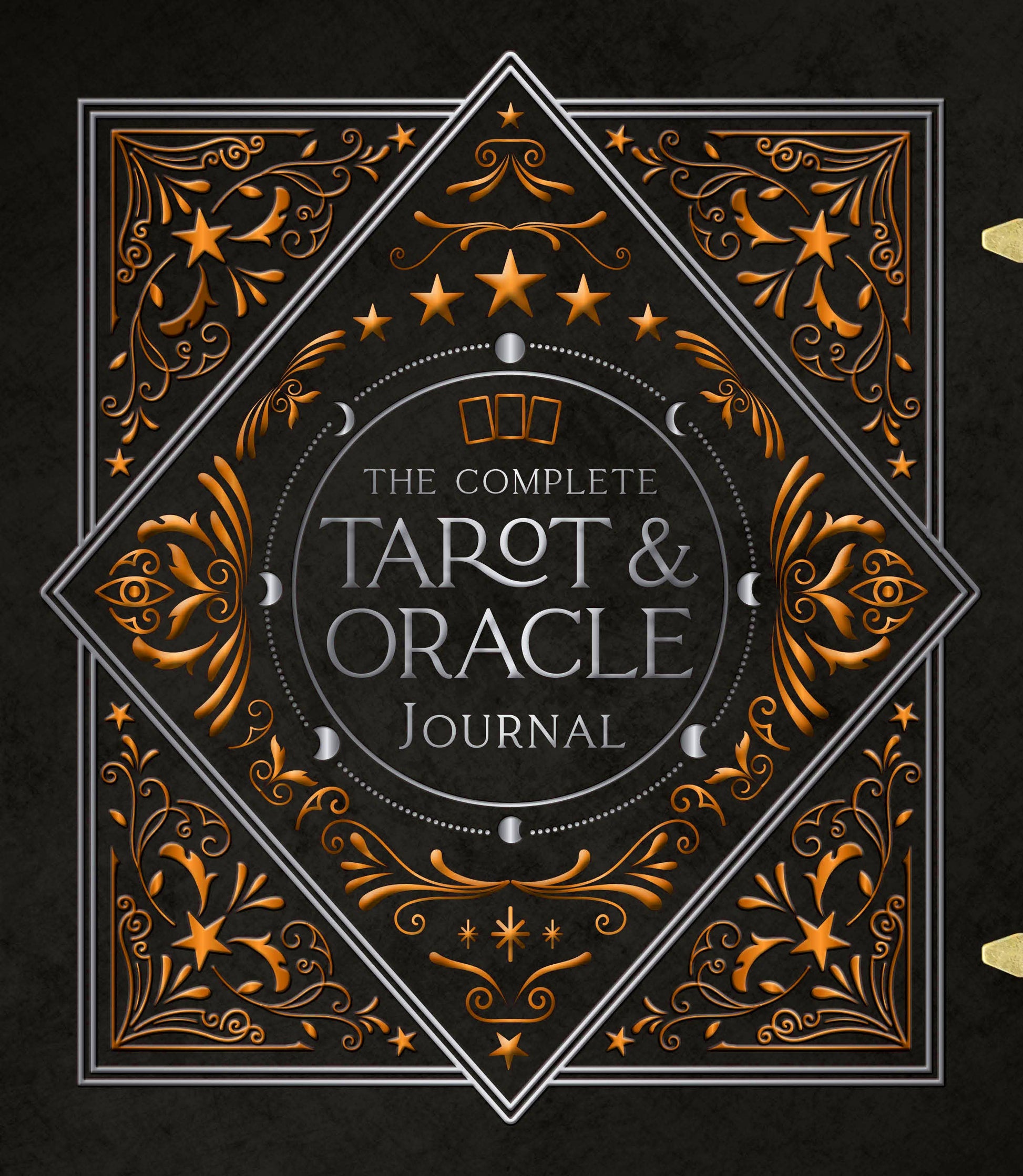 Decorative cover of 'The Complete Tarot & Oracle Journal' with intricate gold designs on a dark background.