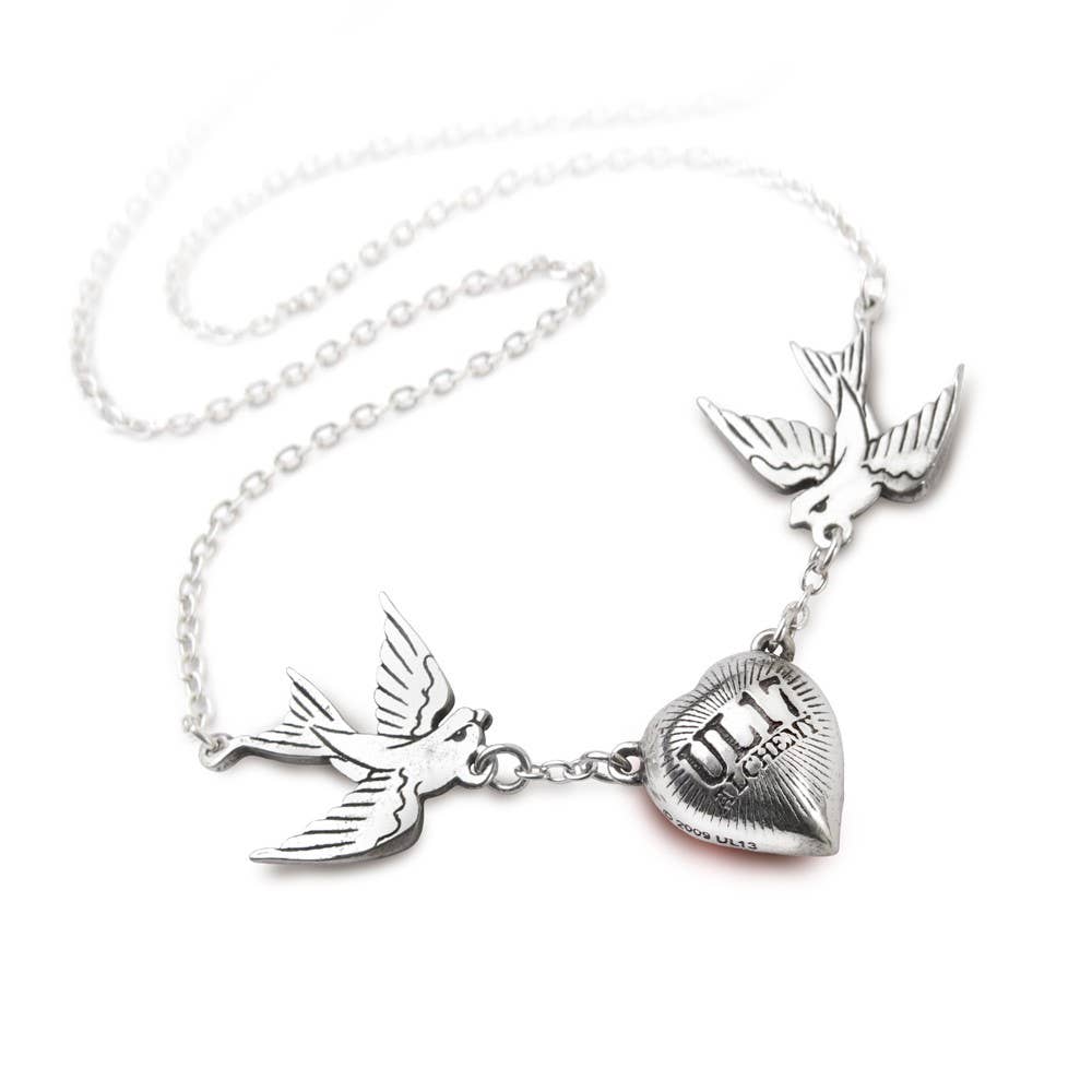 Silver necklace with heart pendant and bird-shaped pendants on a white background