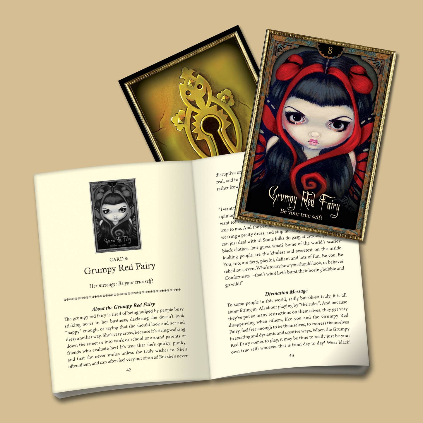 Open book with illustrations of a grumpy red fairy and a key, on a beige background.