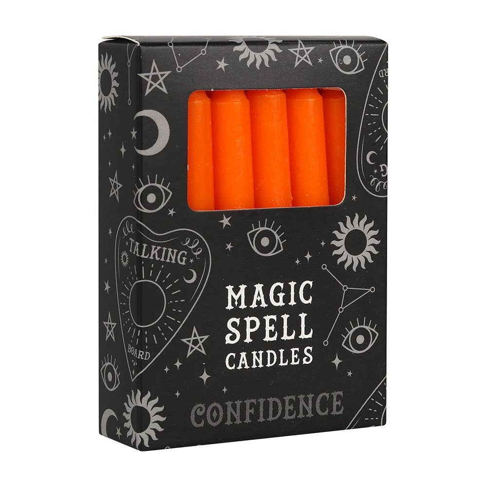 Box of orange spell candles labeled 'Confidence' with mystical designs on a white background