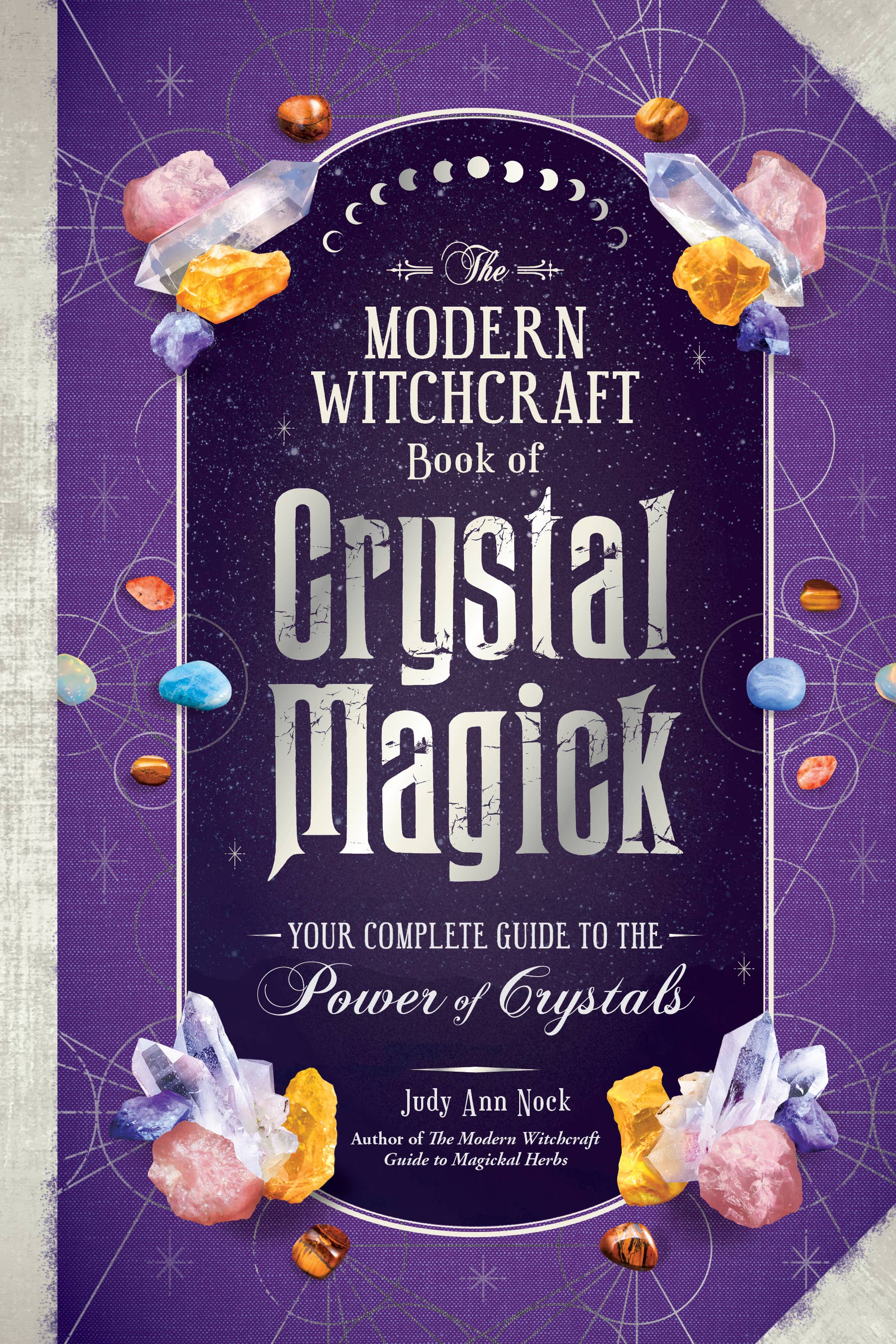 Book cover of 'The Modern Witchcraft Book of Crystal Magick' with crystals and astrological symbols on a purple background.