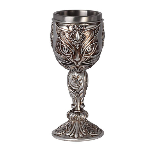 Decorative silver goblet with intricate designs on a white background