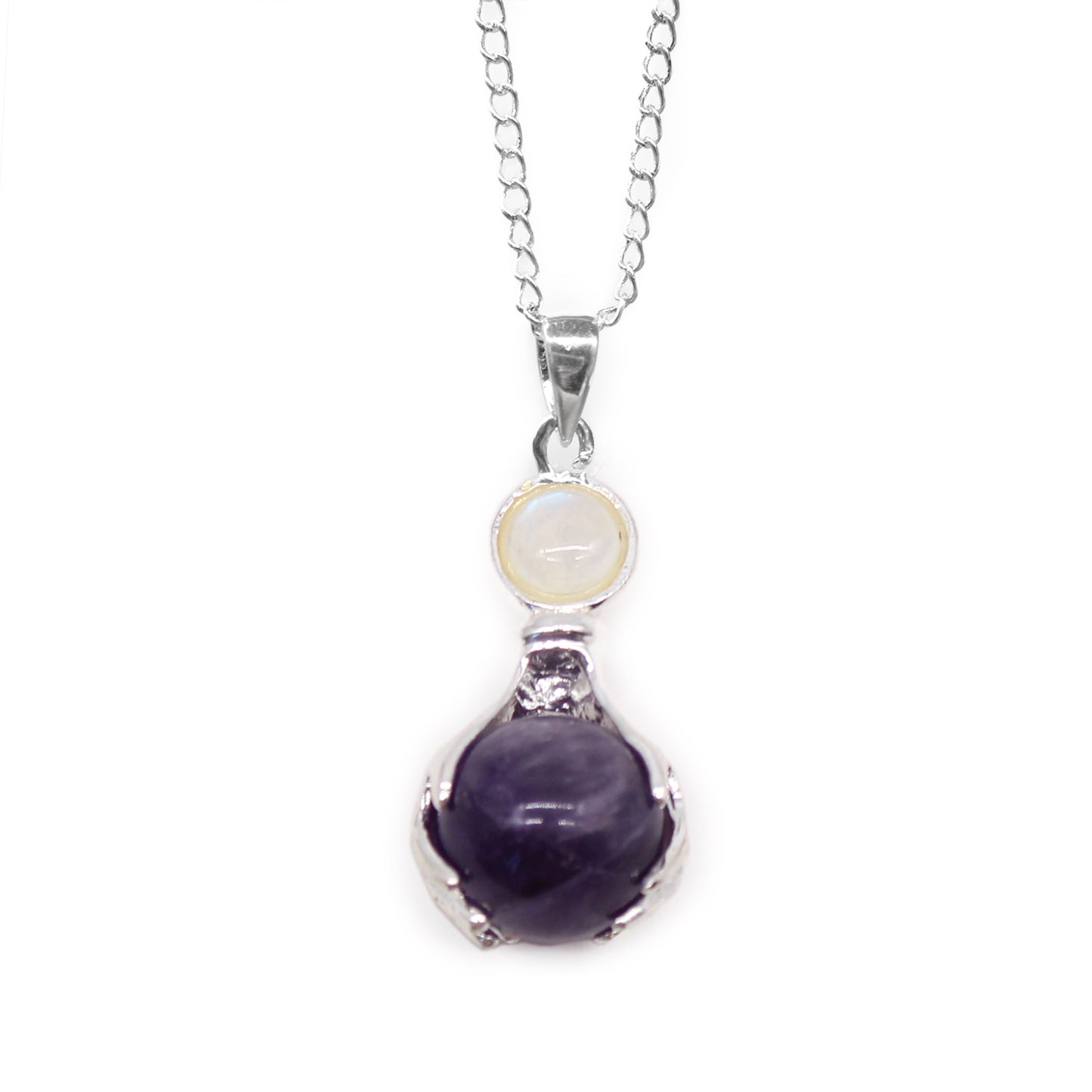 Necklace with a purple amethyst gemstone enclosed in a healing hands pendant on a white background