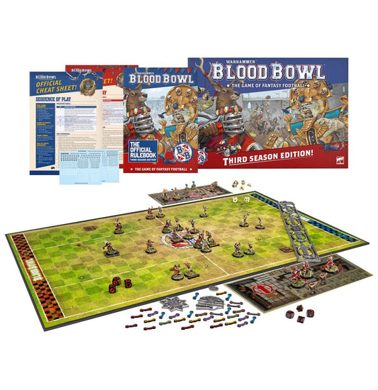 Warhammer Blood Bowl game set with rules and board on a white background