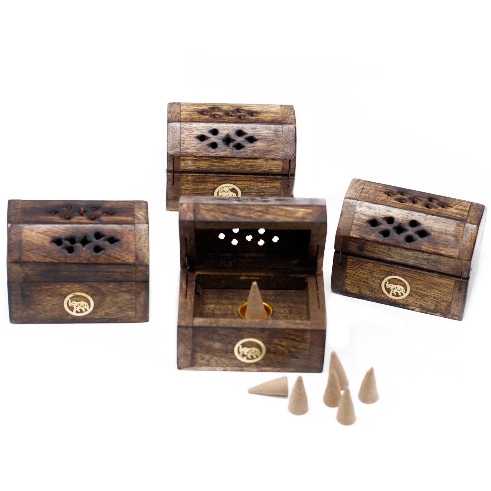 Wooden incense burners with cones on a white background