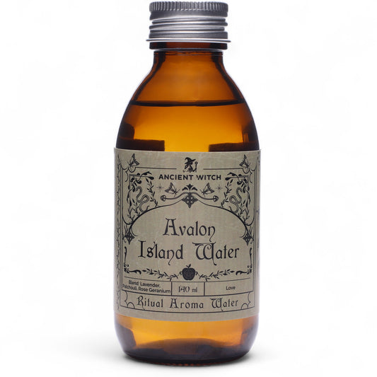 Brown bottle containing Avalon Island ritual waters with grey label and gothic design