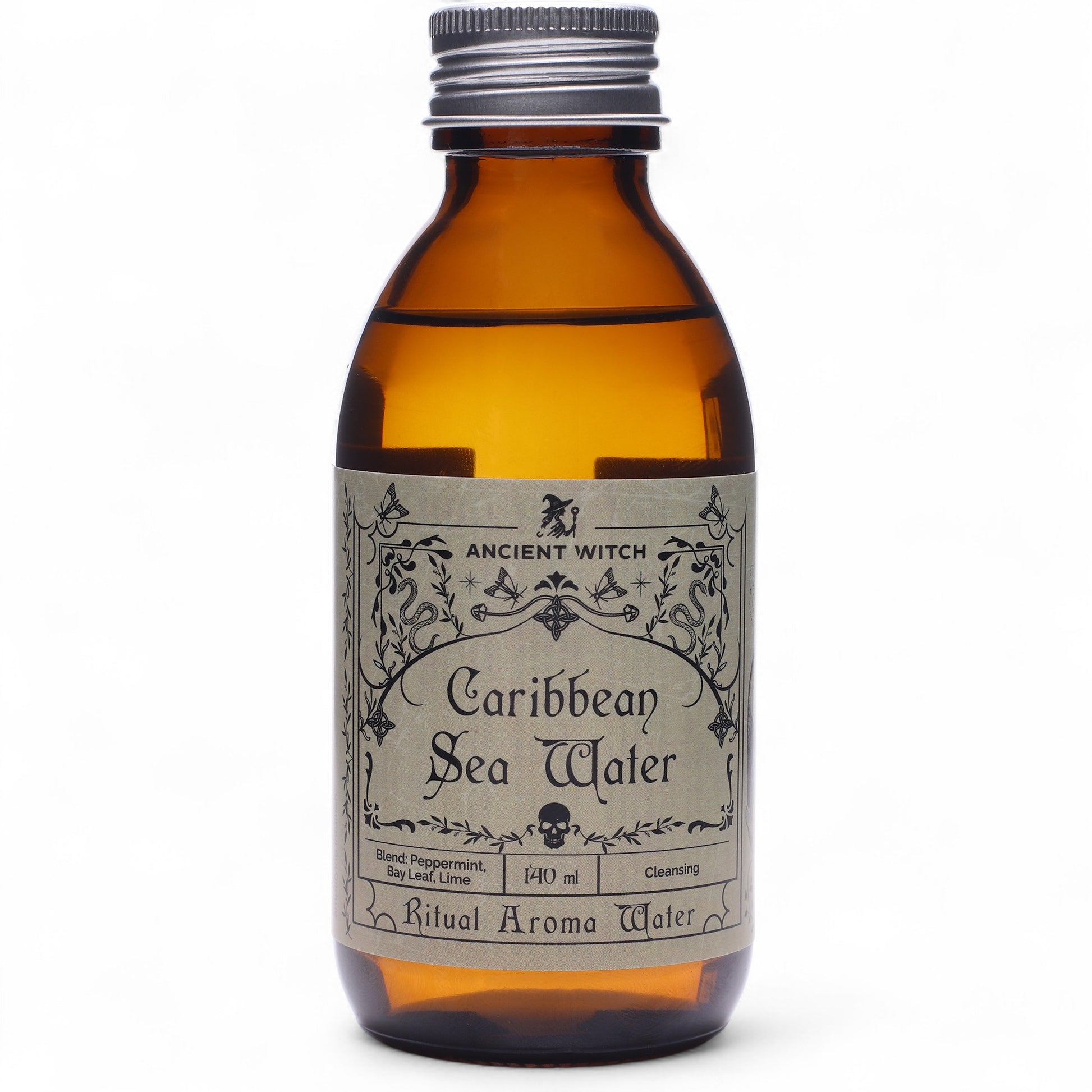 Brown bottle with grey label detailing Caribbean Sea Water from Ancient Witch
