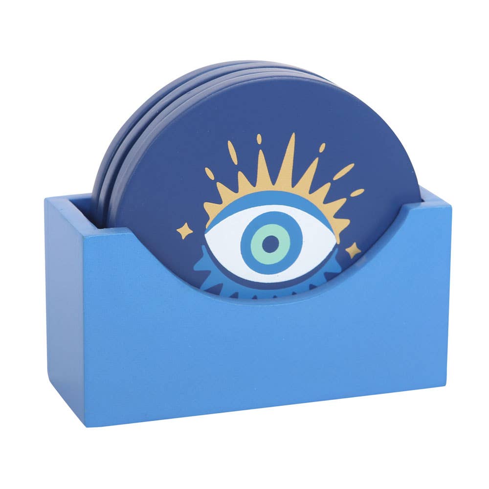 Set of blue coasters with eye design in a blue holder on a white background