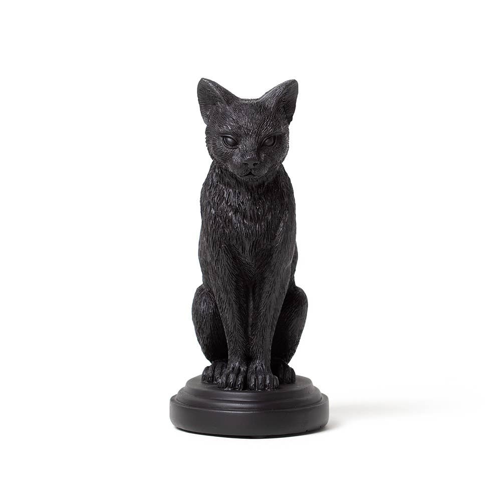 Black cat statue on a white background
