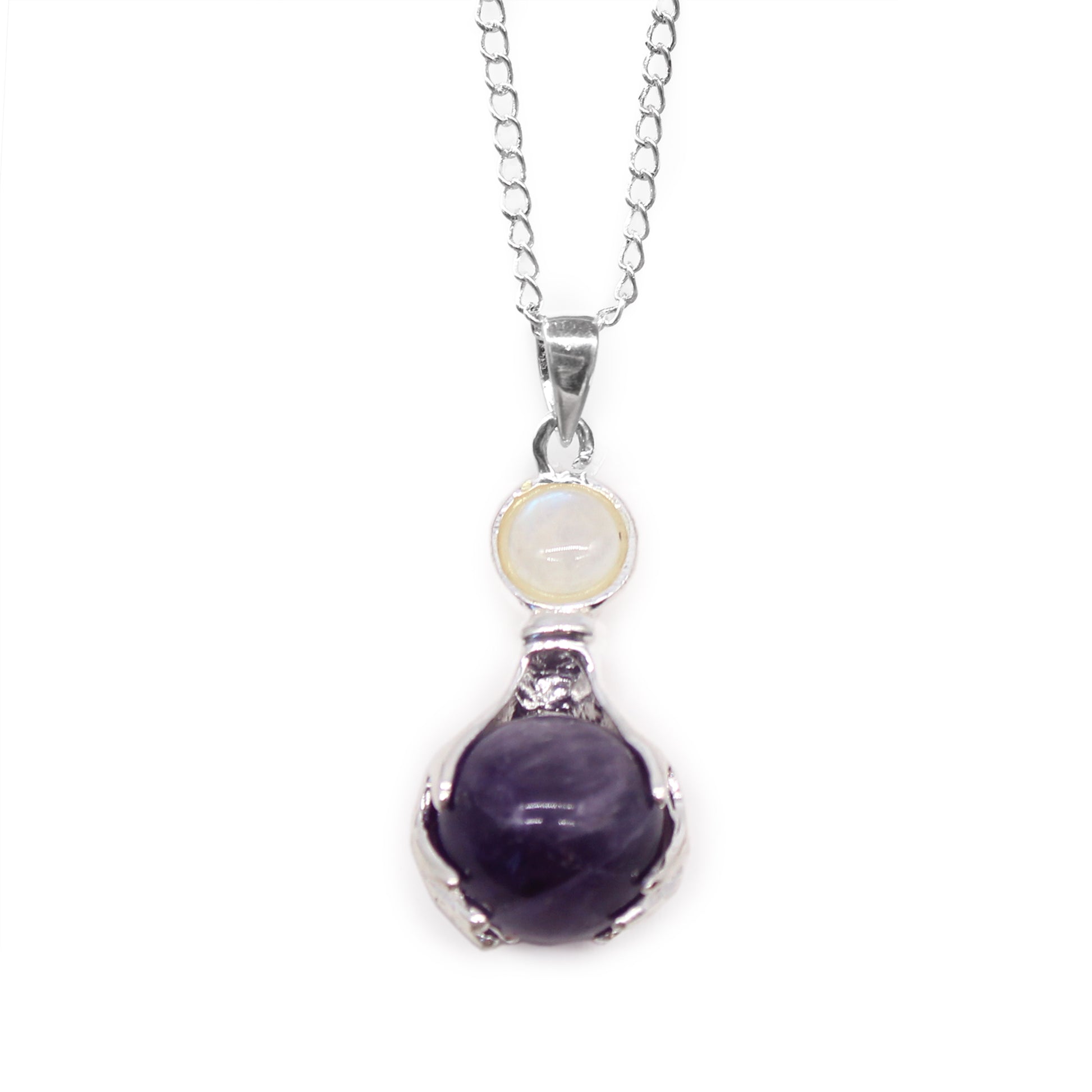 Necklace with a purple amethyst gemstone enclosed in a healing hands pendant on a white background