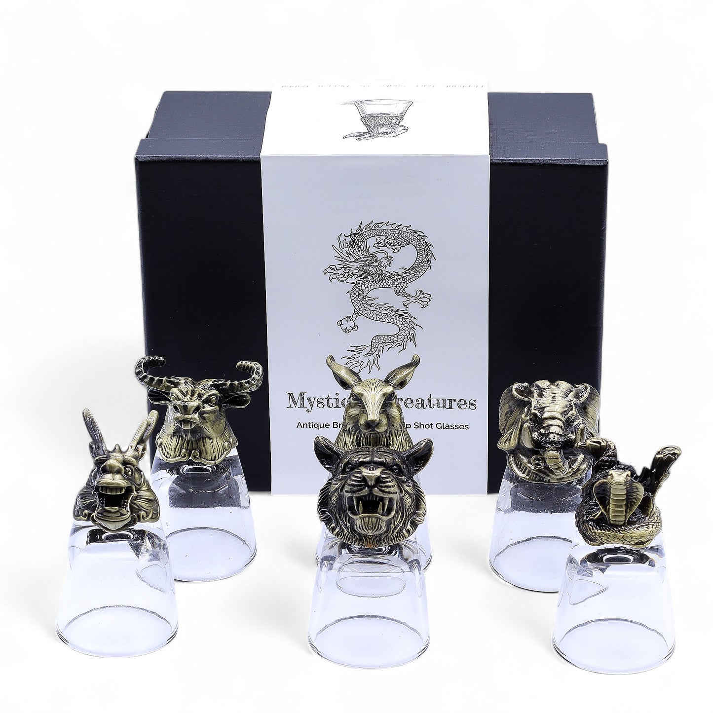 Mystical creatures shot glasses pictured in front of gift box on white background
